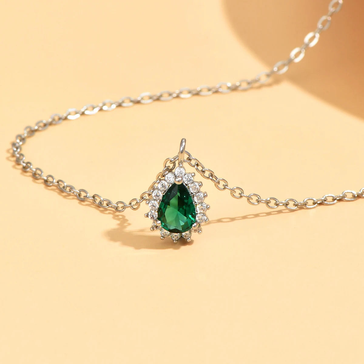 Water Drop Zircon Pendant Necklace – Inlaid Zircon on Polished Stainless Steel, Designed for Elegant Occasions